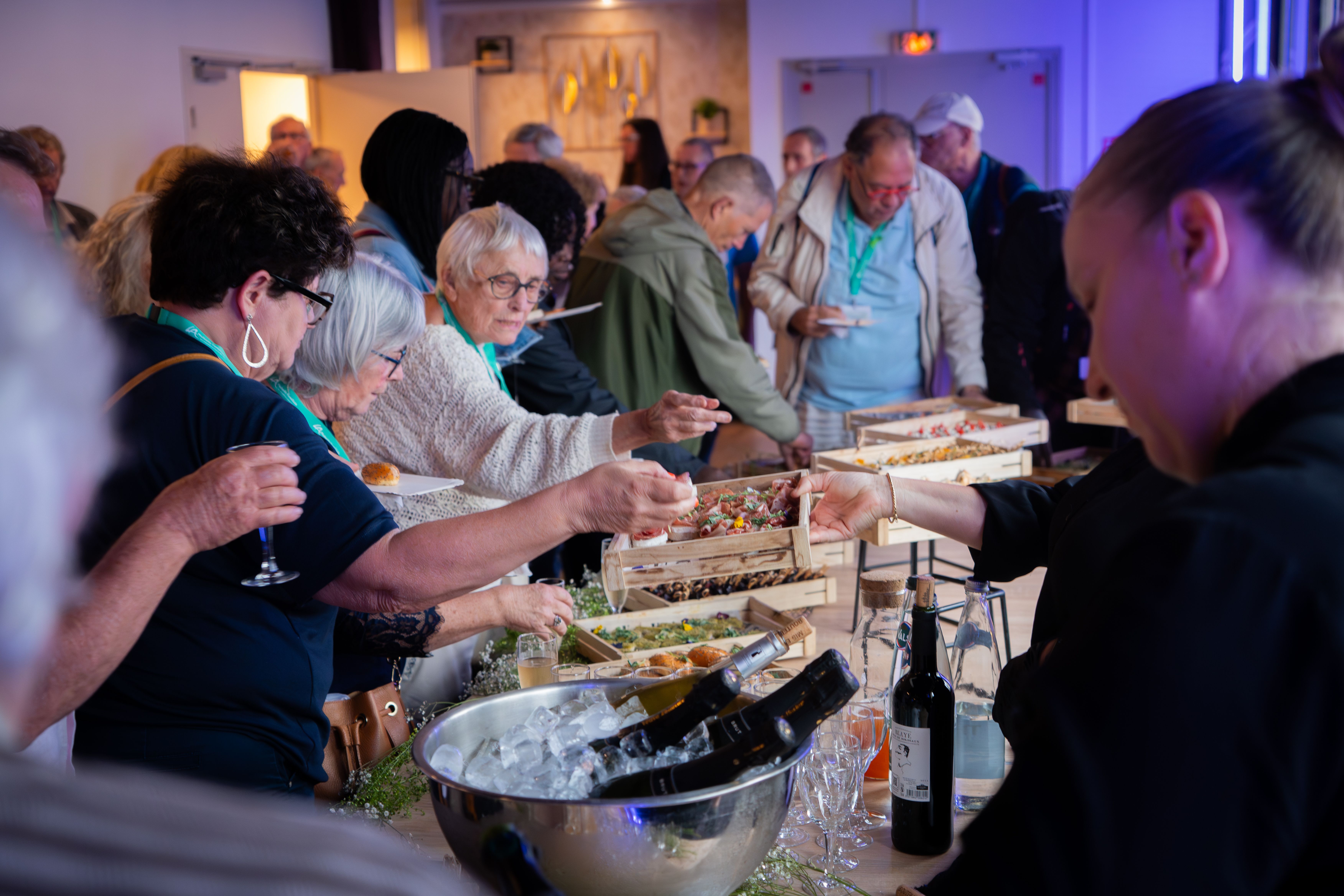 Guests enjoying food at a tasting event